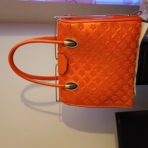 FASHION  HANDBAG WITH STRAP I have never used it since I bought it